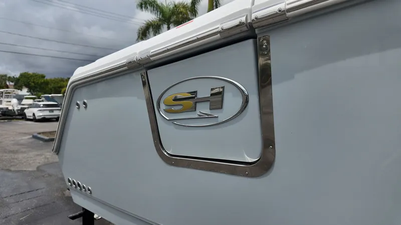 Slide: The Image of Close-up of the Sea Hunt logo on a boat. - 45