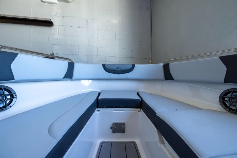 Slide: The Image of Interior view of 2026 Chaparral 250 OSX boat with sleek seating and modern design. - 14