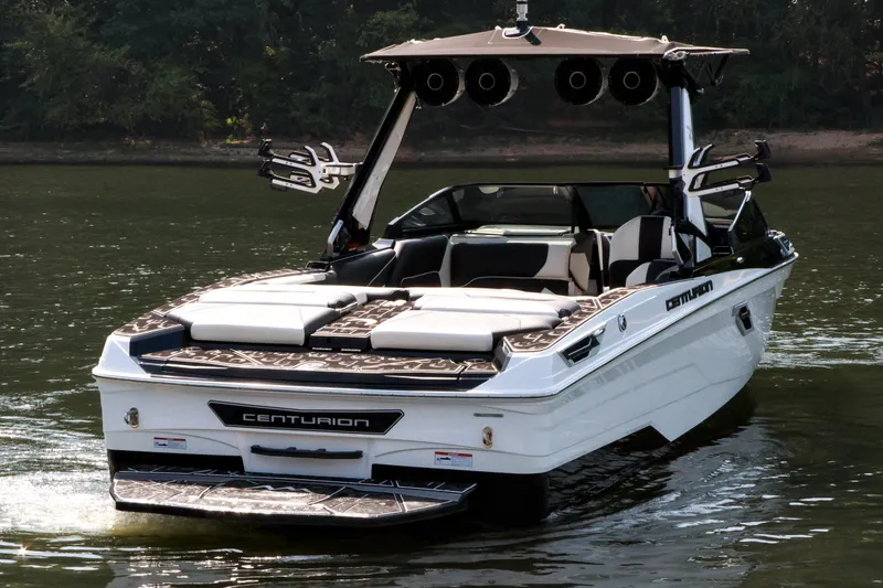 Slide: The Image of 2022 Centurion Ri265 boat on water, featuring sleek design and modern amenities. - 7