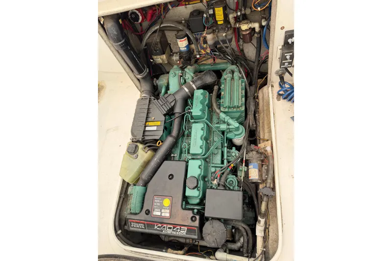 Slide: The Image of Engine compartment of a 2004 Osprey Expedition 26 boat with Volvo Penta KAD43. - 13