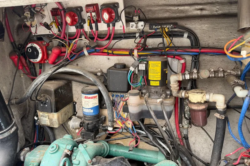 Slide: The Image of Electrical and mechanical components inside a 2004 Osprey Expedition 26 boat. - 14