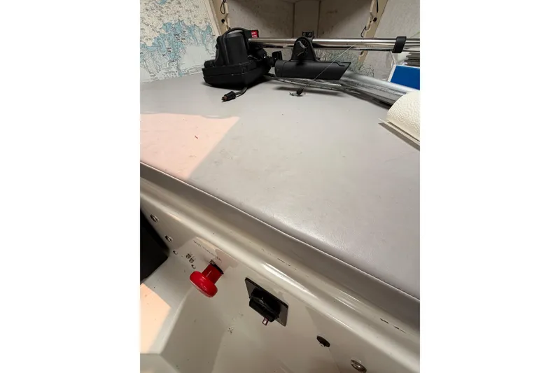 Slide: The Image of Interior of 2004 Osprey Expedition 26 boat with navigation equipment and map. - 8