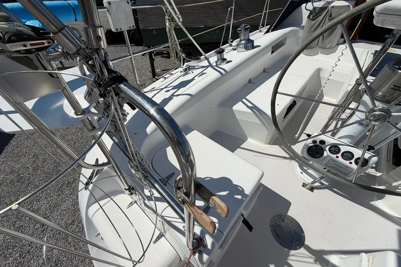 Slide: The Image of Cockpit of a 2003 Catalina 380 sailboat with steering wheel and navigation instruments. - 28