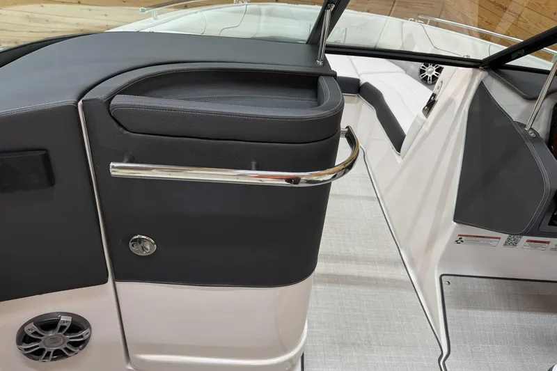 Slide: The Image of Interior view of a 2025 Regal LS6 boat, featuring sleek seating and modern design elements. - 9
