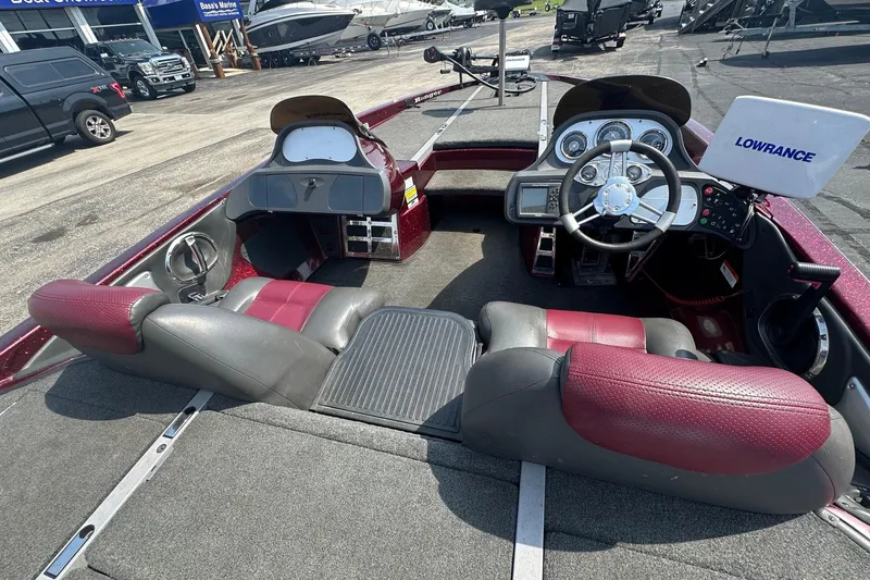 Slide: The Image of 2006 Ranger Z20 Comanche boat interior with steering wheel and Lowrance electronics. - 7