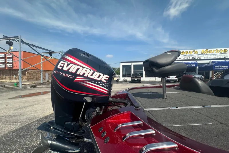 Slide: The Image of 2006 Ranger Z20 Comanche boat with Evinrude E-TEC engine at marina. - 11