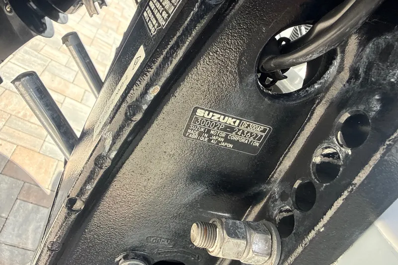 Slide: The Image of Close-up of a Suzuki DF300AP motor on a 1995 Intrepid 323 Open boat. - 79