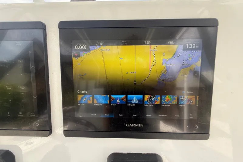 Slide: The Image of Garmin navigation display on 1995 Intrepid 323 Open boat, showing detailed marine charts. - 24