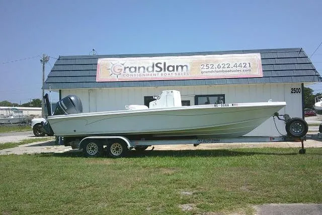 The Image of 2006 SeaChaser 250 BAYRUNNER boat on trailer outside Grand Slam Consignment Boat Sales. - 1