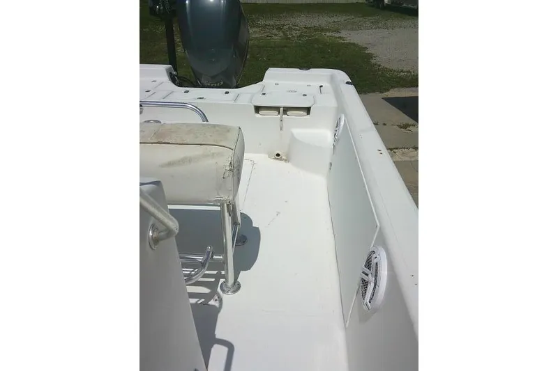 Slide: The Image of 2006 SeaChaser 250 BAYRUNNER boat interior with seating and storage compartments. - 11