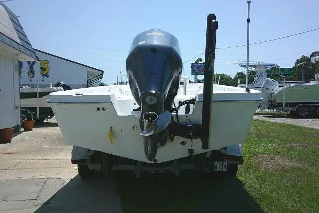 Slide: The Image of 2006 SeaChaser 250 BAYRUNNER boat with outboard motor, parked on trailer. - 4