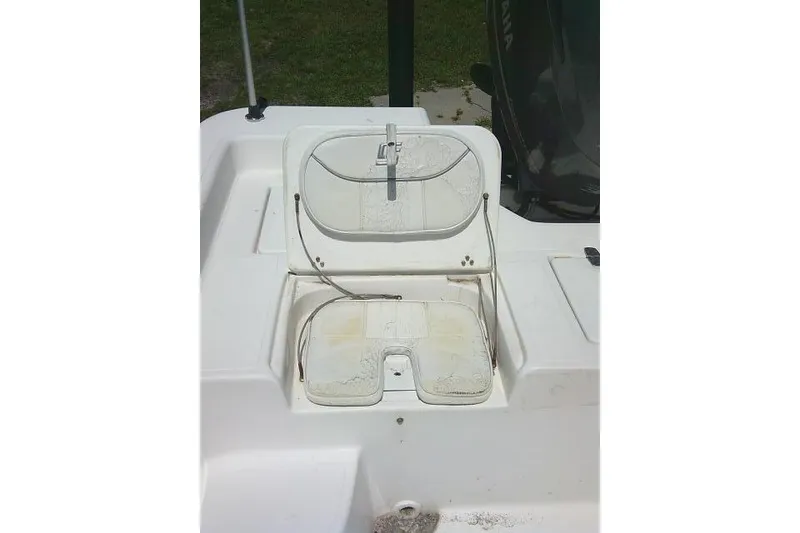 Slide: The Image of 2006 SeaChaser 250 BAYRUNNER boat storage compartment with open hatch. - 15
