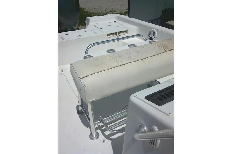 Slide: The Image of 2006 SeaChaser 250 BAYRUNNER boat interior with seating and storage compartments. - 13