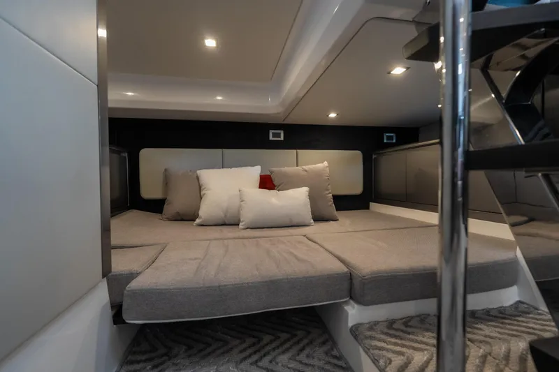 Slide: The Image of Luxurious interior cabin of 2024 Schaefer 375 yacht with plush cushions and modern lighting. - 36