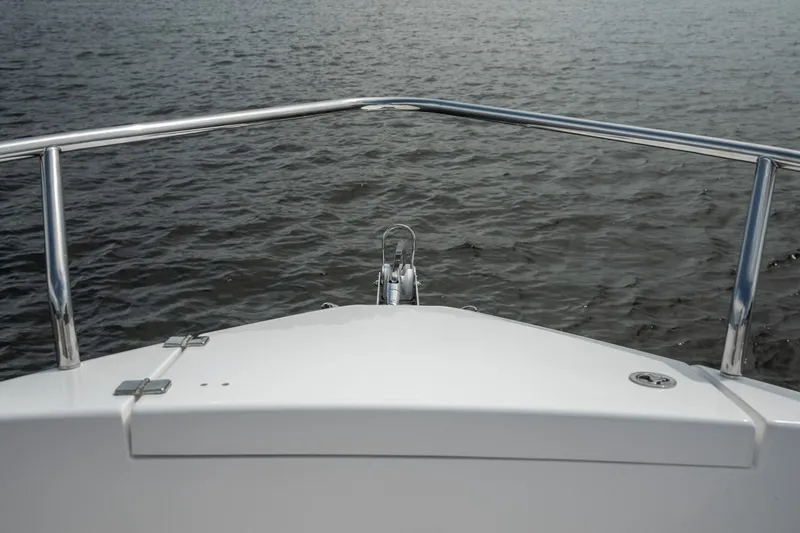 Slide: The Image of Bow view of 2024 Schaefer 375 yacht on calm water. - 44
