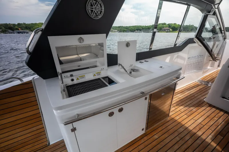 Slide: The Image of Luxury outdoor kitchen on 2024 Schaefer 375 yacht with grill and sink. - 18