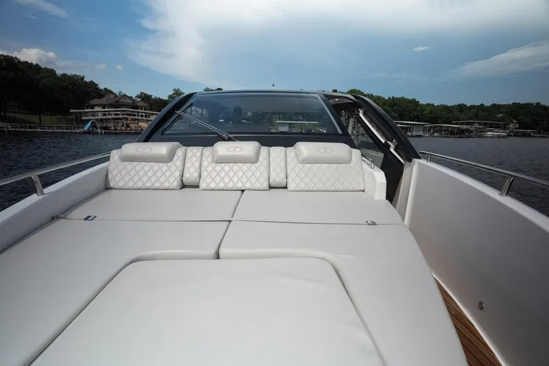 Slide: The Image of Luxurious 2024 Schaefer 375 yacht with elegant white seating on a serene lake. - 46