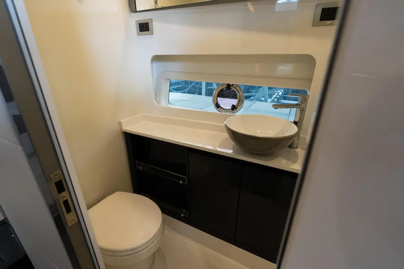 Slide: The Image of Modern bathroom interior in 2024 Schaefer 375 yacht, featuring sleek sink and compact design. - 38