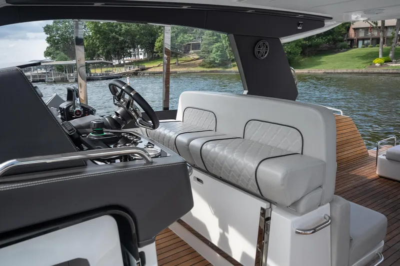 Slide: The Image of Luxurious interior of 2024 Schaefer 375 yacht with elegant seating and modern controls. - 20