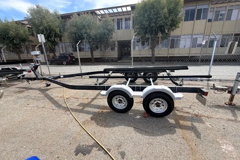 Slide: The Image of Boat trailer parked outdoors, suitable for 2021 Bayliner VR6 Bowrider I/O. - 17