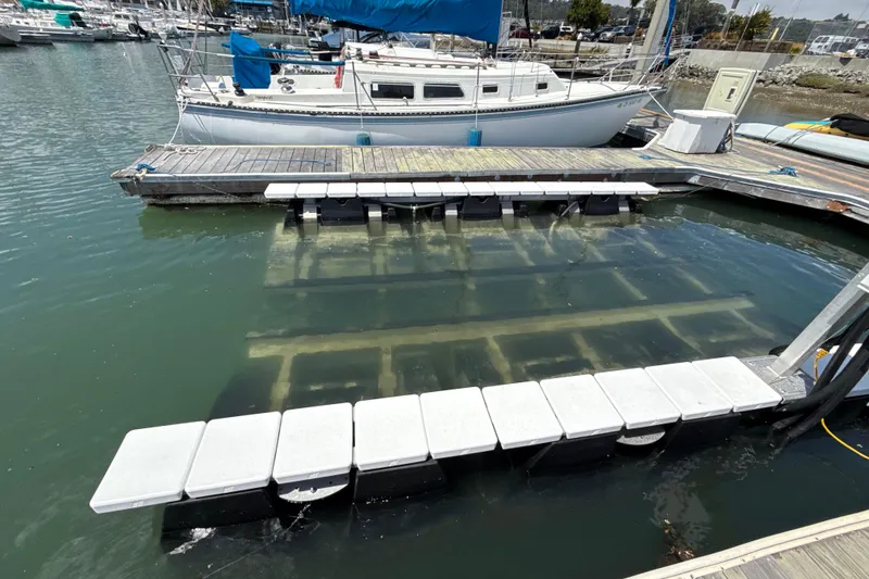 Slide: The Image of Floating dock with submerged Bayliner VR5 Bowrider I/O, 2021 model, at marina. - 15