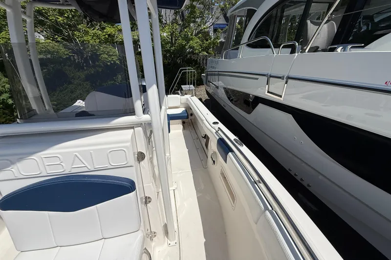 Slide: The Image of 2018 Robalo R222 Explorer boat interior with seating and sleek design. - 17