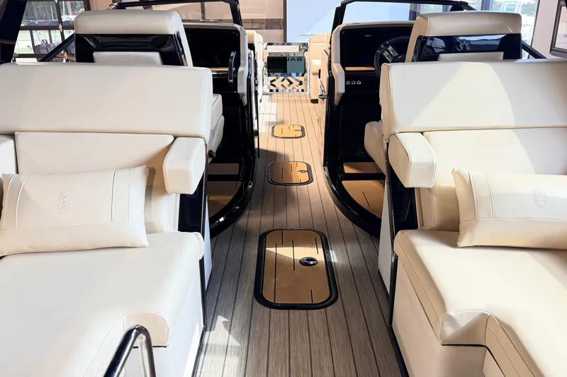 Slide: The Image of Luxurious interior of 2026 Balise Halo 26C Twin boat with plush seating and elegant design. - 6