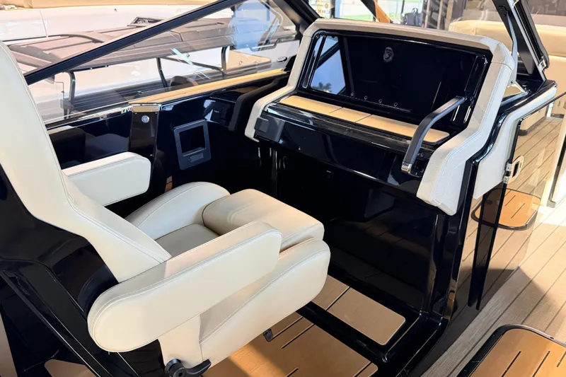 Slide: The Image of Luxurious interior of 2026 Balise Halo 26C Twin boat with plush seating and sleek design. - 8