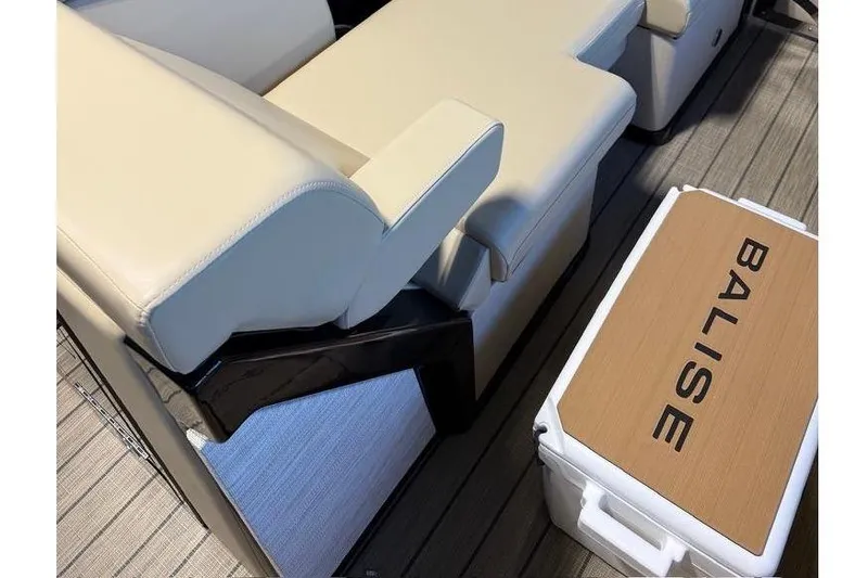 Slide: The Image of Luxurious seating on the 2026 Balise Halo 26C Twin boat, featuring cream upholstery. - 23