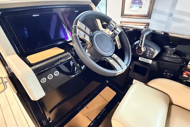 Slide: The Image of Steering console of 2026 Balise Halo 26C Twin with modern controls and displays. - 10