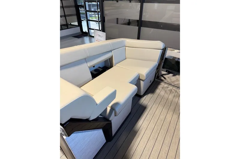 Slide: The Image of Luxurious seating on the 2026 Balise Halo 26C Twin boat, featuring elegant white upholstery. - 17