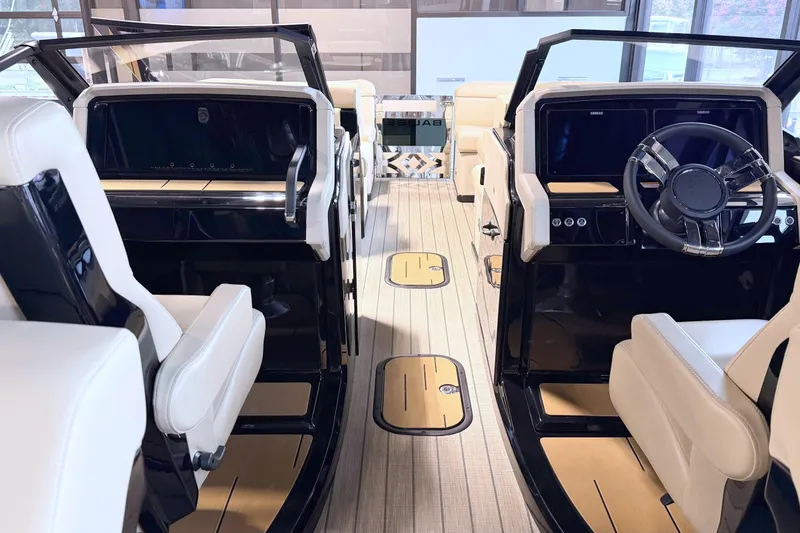 Slide: The Image of The image shows a modern boat cockpit with dual helm stations and beige seating. - 7