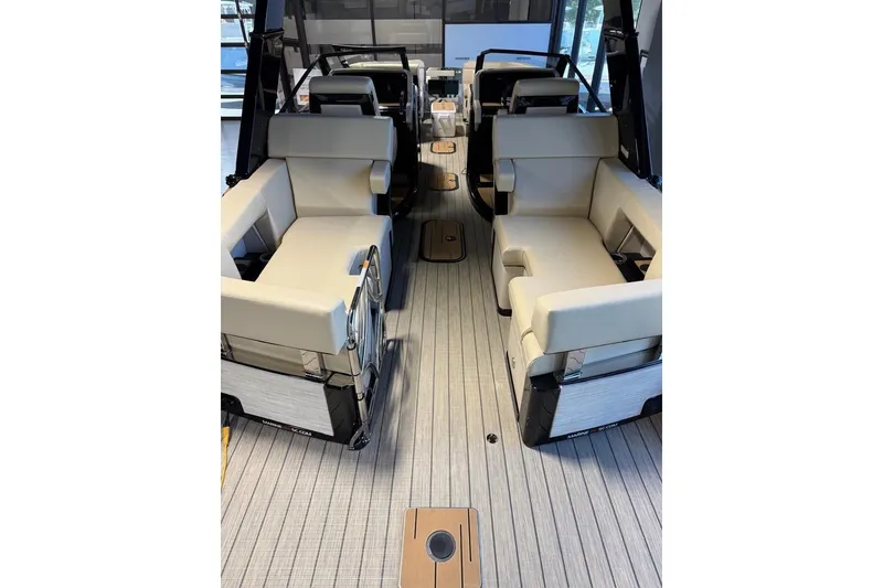 Slide: The Image of Luxurious interior of 2026 Balise Halo 26C Twin boat with plush seating and modern design. - 4