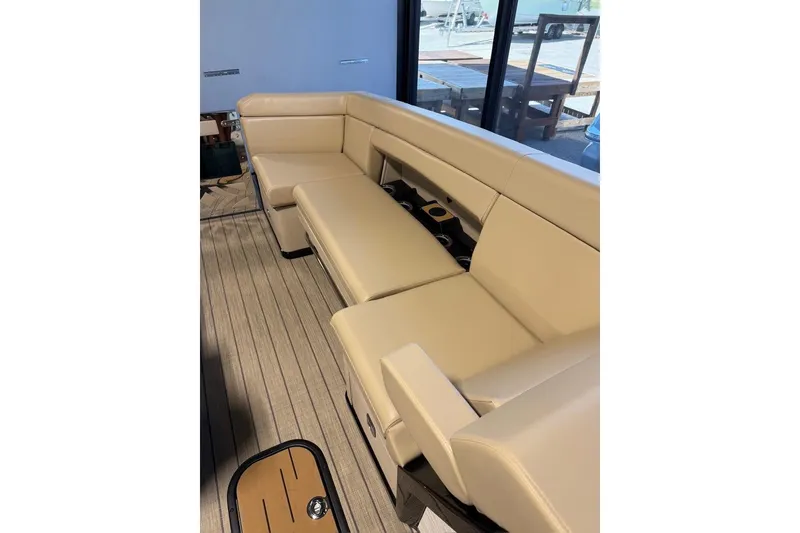 Slide: The Image of Luxurious beige seating on 2026 Balise Halo 26C Twin boat, featuring sleek design and comfort. - 18
