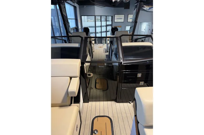 Slide: The Image of Interior view of 2026 Balise Halo 26C Twin boat, featuring sleek seating and modern design. - 11