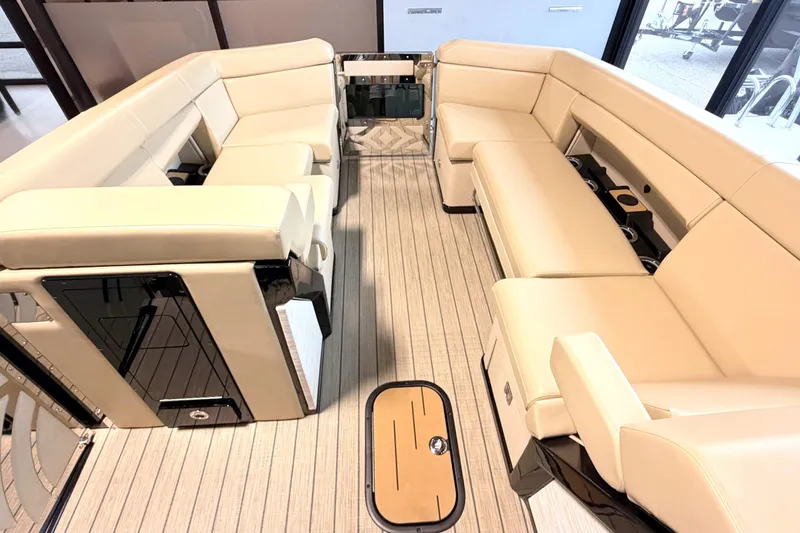 Slide: The Image of The image shows the interior of a 2026 Balise Halo 26C Twin with beige leather seating. - 19