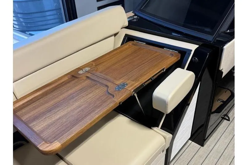 Slide: The Image of Luxurious interior of 2026 Balise Halo 26C Twin with foldable wooden table. - 22