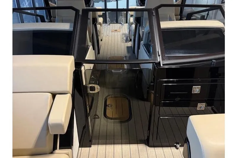 Slide: The Image of Interior view of 2026 Balise Halo 26C Twin boat, featuring sleek seating and modern design. - 18