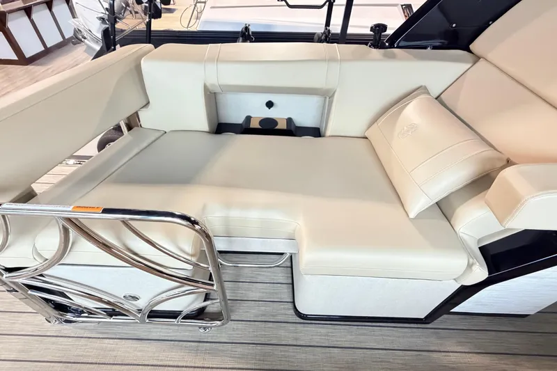 Slide: The Image of Luxurious seating on the 2026 Balise Halo 26C Twin boat, featuring elegant beige upholstery. - 5