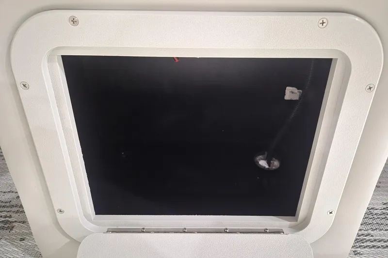 Slide: The Image of Hatch opening of 2026 Sylvan R-22 LZ DH boat, showcasing interior compartment. - 14