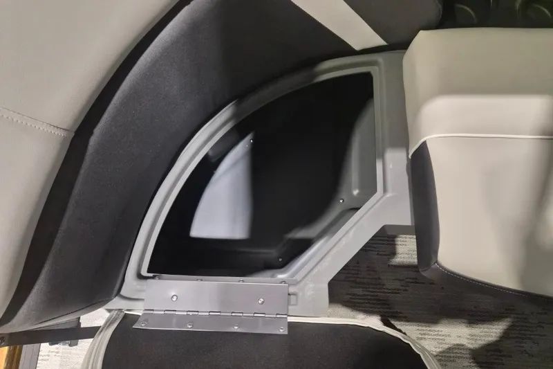 Slide: The Image of Storage compartment in 2026 Sylvan R-22 LZ DH boat, featuring sleek interior design. - 4