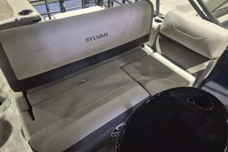 Slide: The Image of Luxurious seating on 2026 Sylvan R-22 LZ DH boat, featuring sleek design and comfort. - 11