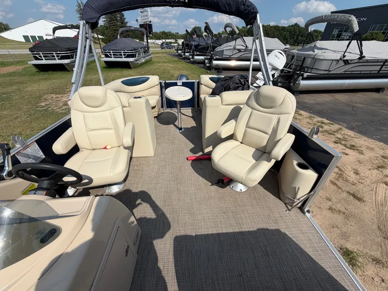 Slide: The Image of 2018 Sylvan Mirage 8522 LZ Pontoon with beige seats and open deck. - 5