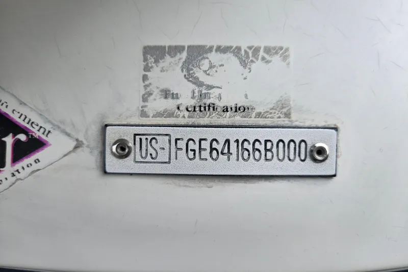 Slide: The Image of VIN plate on a 2000 Cobalt 246 boat, displaying identification number. - 39