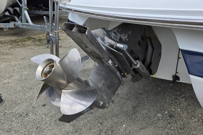 Slide: The Image of Close-up of a Cobalt 246 boat's propeller and outdrive, model year 2000. - 7