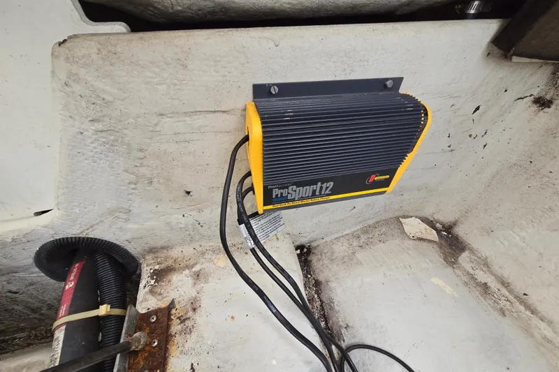 Slide: The Image of ProSport12 marine battery charger installed in a 2000 Cobalt 246 boat. - 31