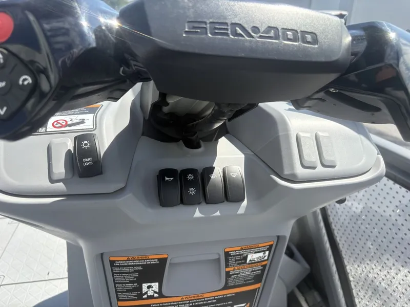 Slide: The Image of Close-up of a Sea-Doo Switch Cruise 21 console with various switches. - 10