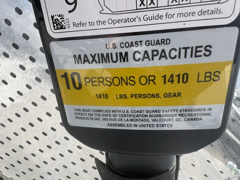Slide: The Image of Sign shows maximum capacity of 10 persons or 1410 pounds. - 24