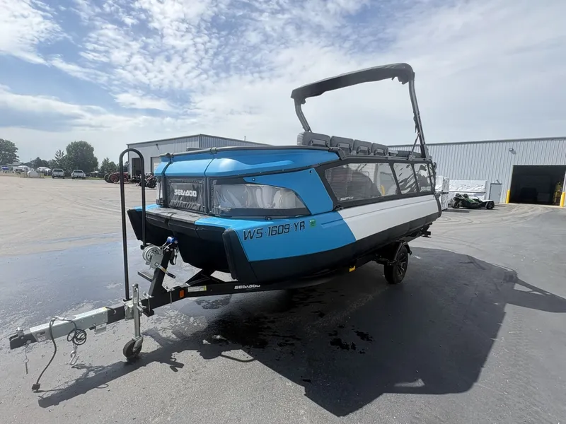 The Image of A 2023 Sea-Doo Switch Cruise 21 on a trailer, ready for transport. - 1