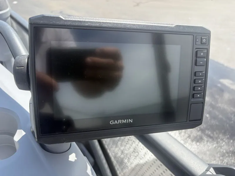 Slide: The Image of A Garmin navigation device is mounted on a boat. - 11